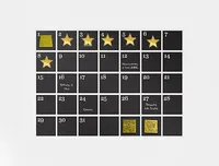 A calendar with gold stars on it, seinfeld-hack style