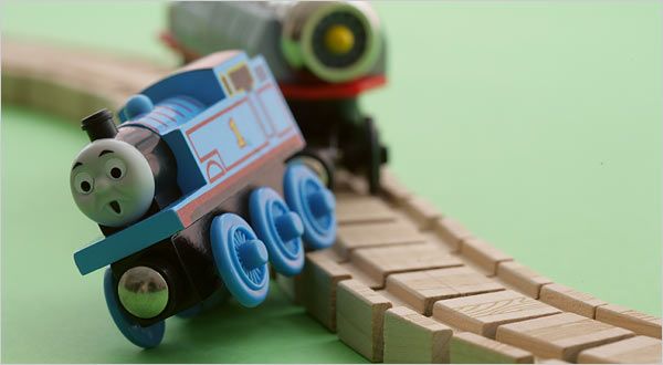 wooden toy train derailing