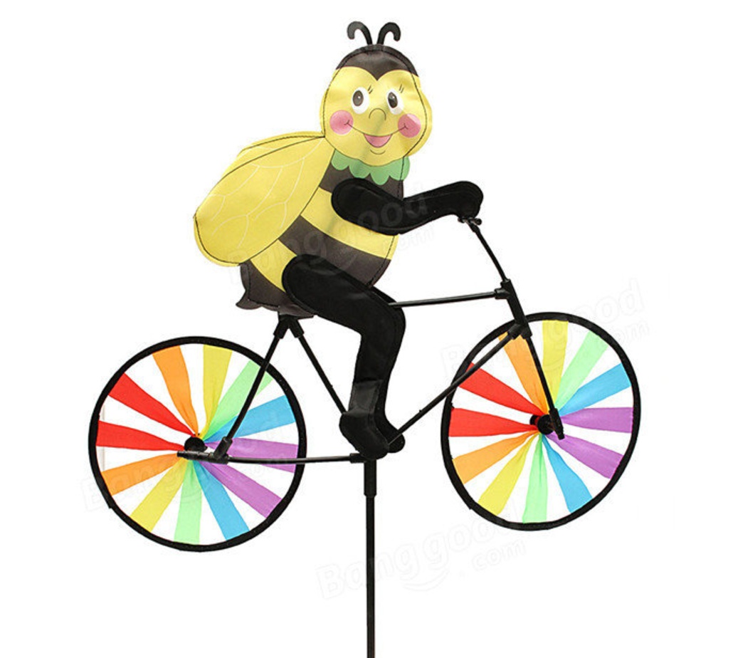 Bee riding a rainbow bike